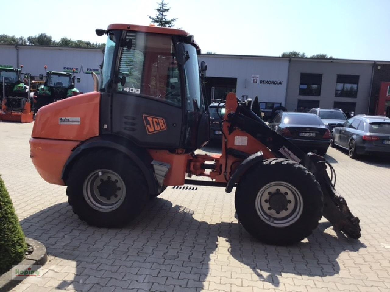 Chargeuse sur pneus JCB 409: photos 7