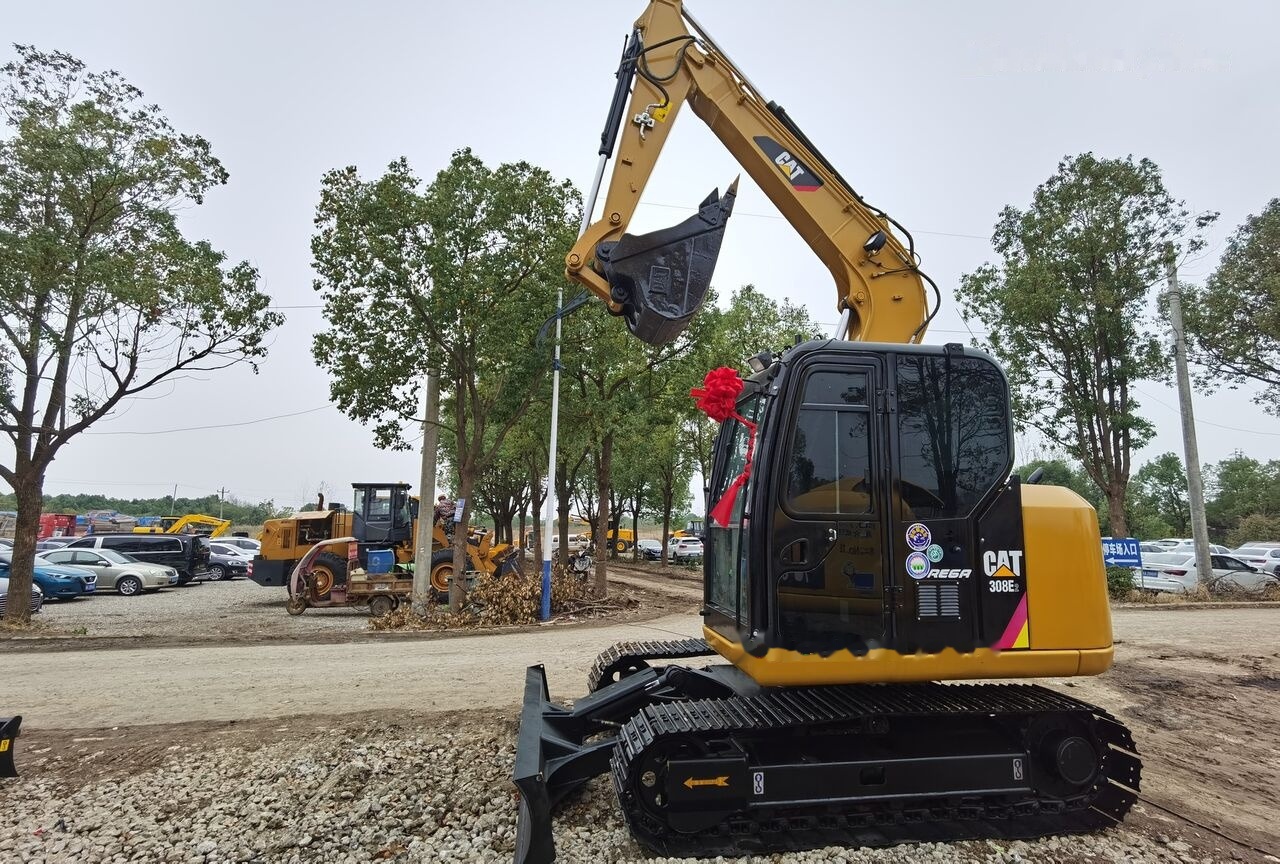 Caterpillar 308E2 - Mini pelle: photos 1 Caterpillar 308E2 - Mini pelle: photos 1