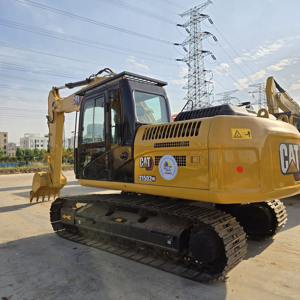 Caterpillar 315D2 - Pelle sur chenille: photos 3 Caterpillar 315D2 - Pelle sur chenille: photos 3