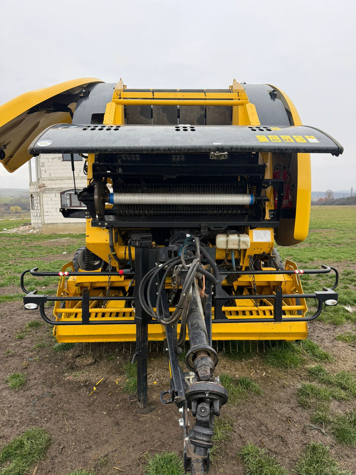 New Holland Roll-Belt 180 Baler - Presse à balles rondes: photos 2 New Holland Roll-Belt 180 Baler - Presse à balles rondes: photos 2
