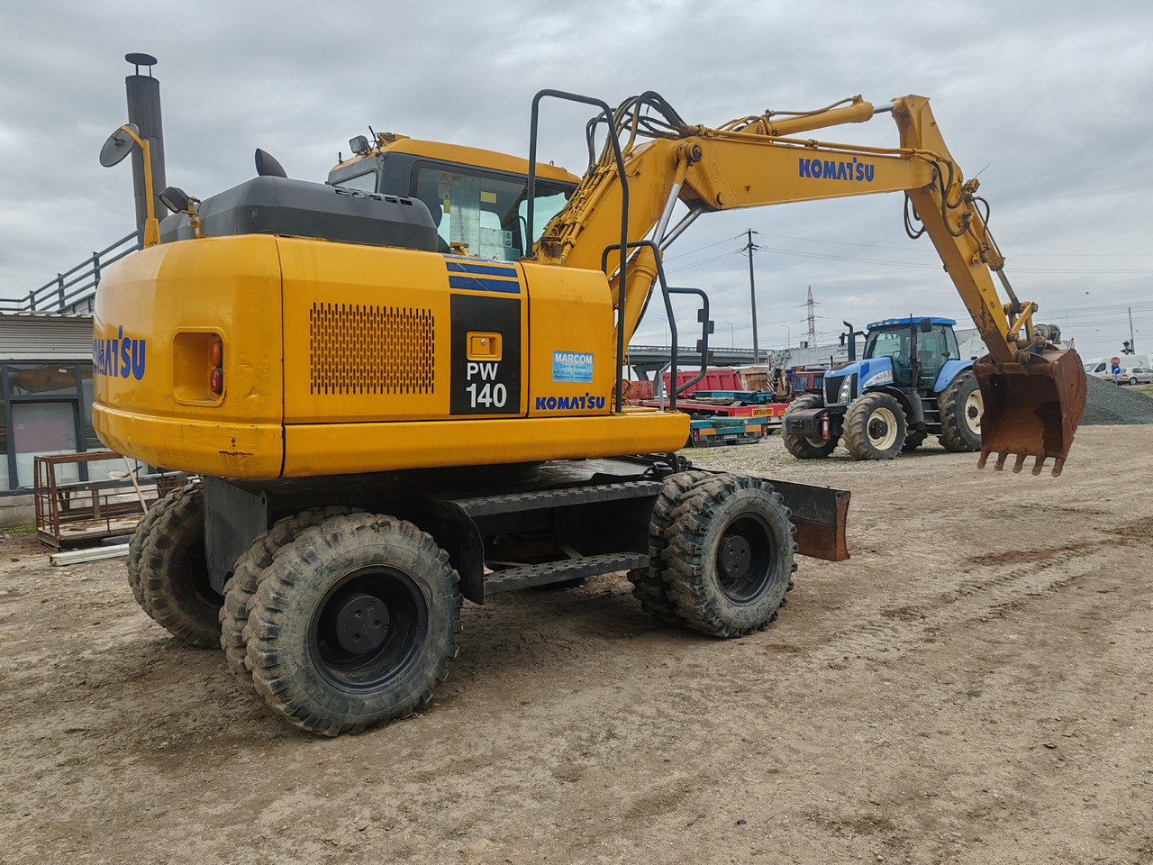 Komatsu PW140-7 - Pelle sur pneus: photos 3 Komatsu PW140-7 - Pelle sur pneus: photos 3