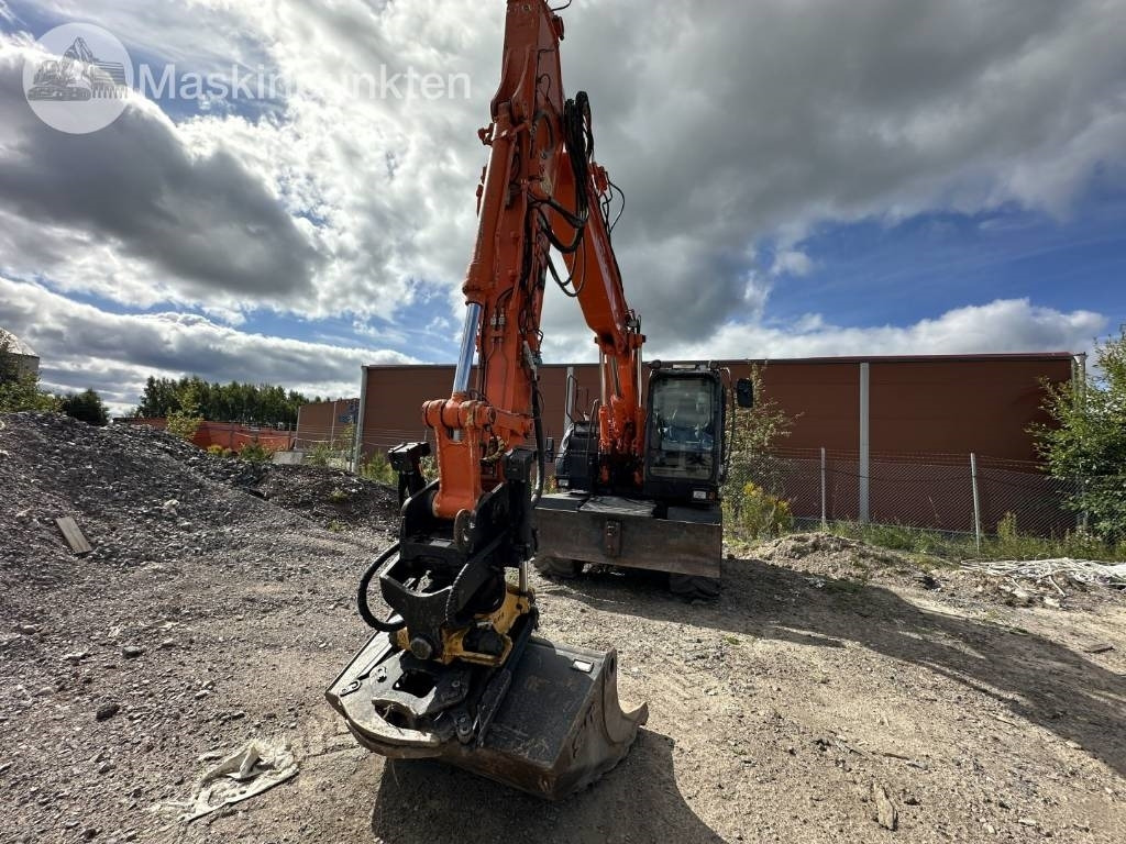 Hitachi ZX 140 W-5B - Pelle sur pneus: photos 2 Hitachi ZX 140 W-5B - Pelle sur pneus: photos 2