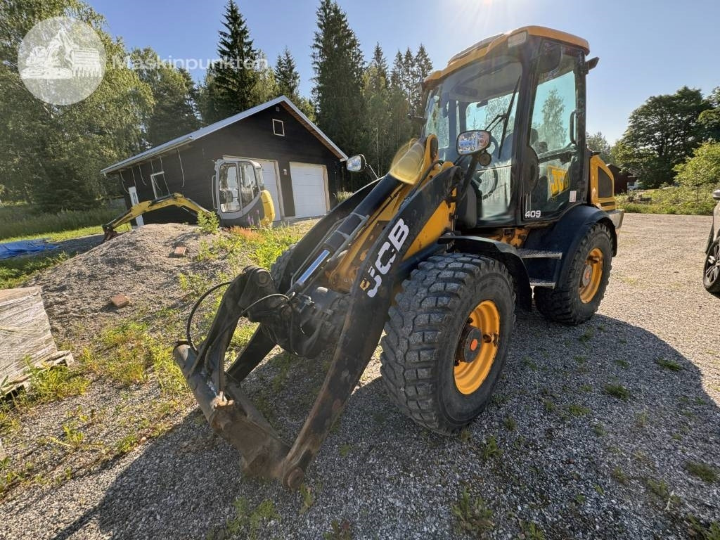 JCB 413 K - Chargeuse sur pneus: photos 1 JCB 413 K - Chargeuse sur pneus: photos 1