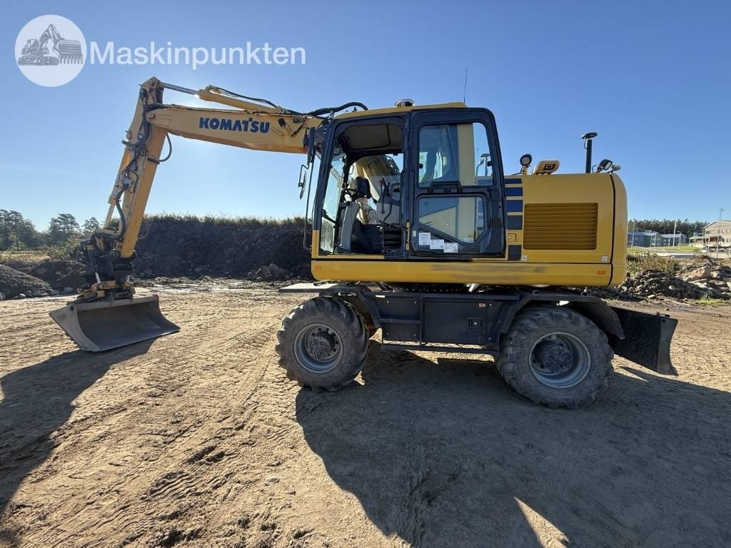 Pelle sur pneus Komatsu PW 160: photos 8