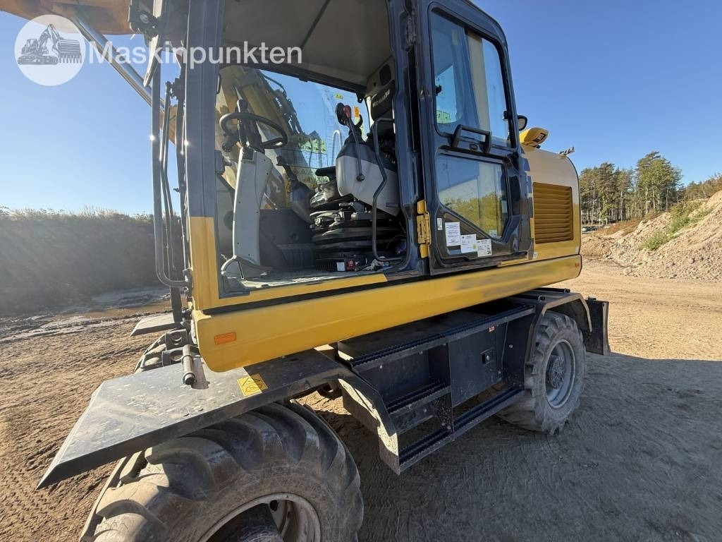 Pelle sur pneus Komatsu PW 160: photos 39