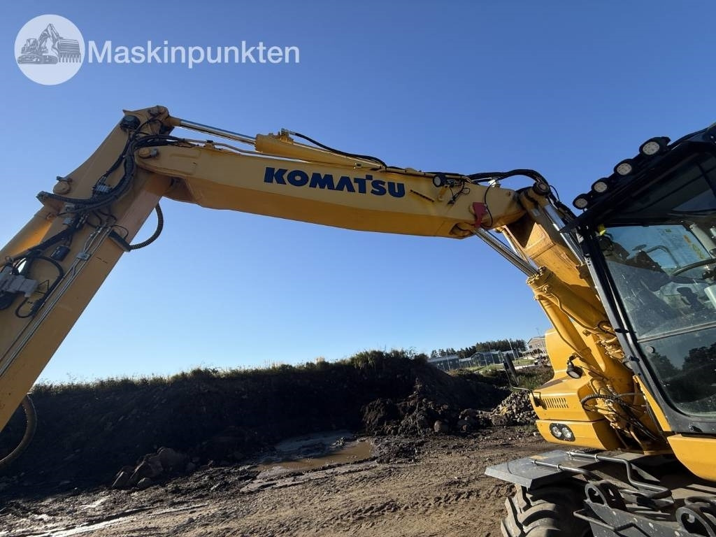 Pelle sur pneus Komatsu PW 160: photos 33