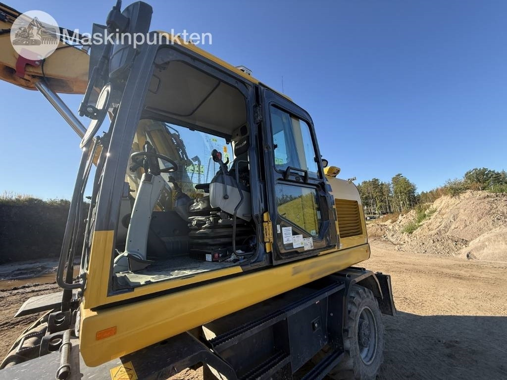 Pelle sur pneus Komatsu PW 160: photos 38