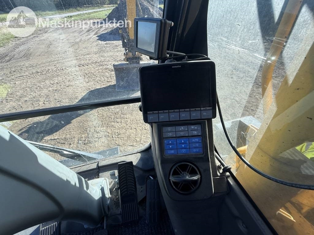 Pelle sur pneus Komatsu PW 160: photos 47
