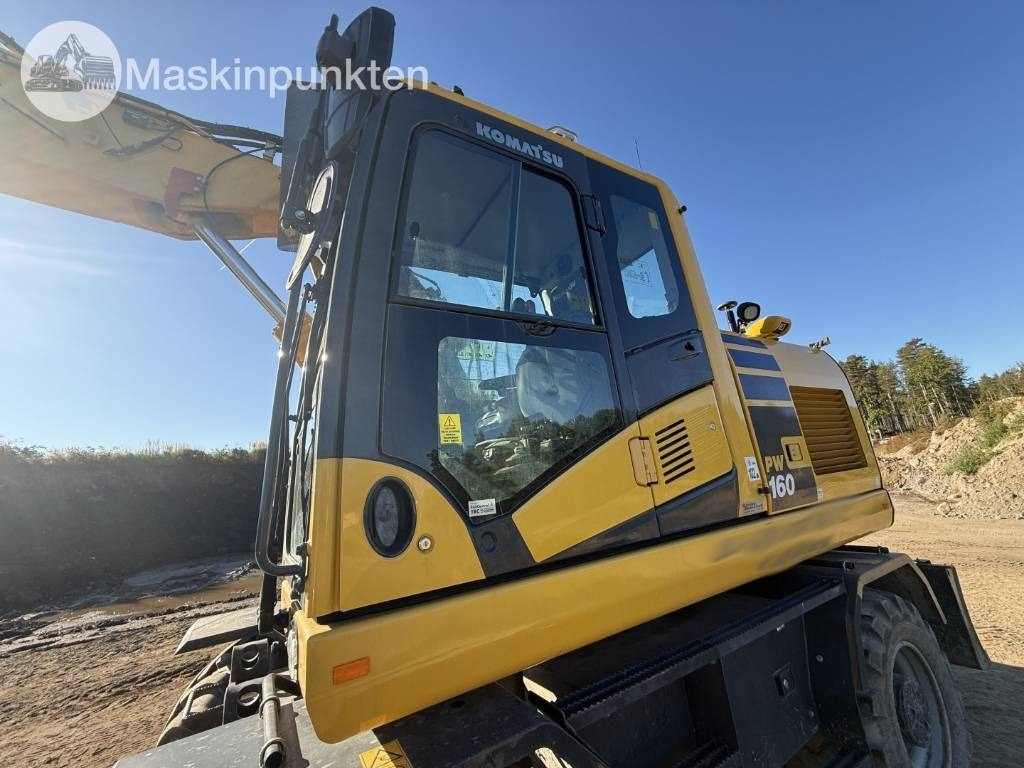 Pelle sur pneus Komatsu PW 160: photos 40