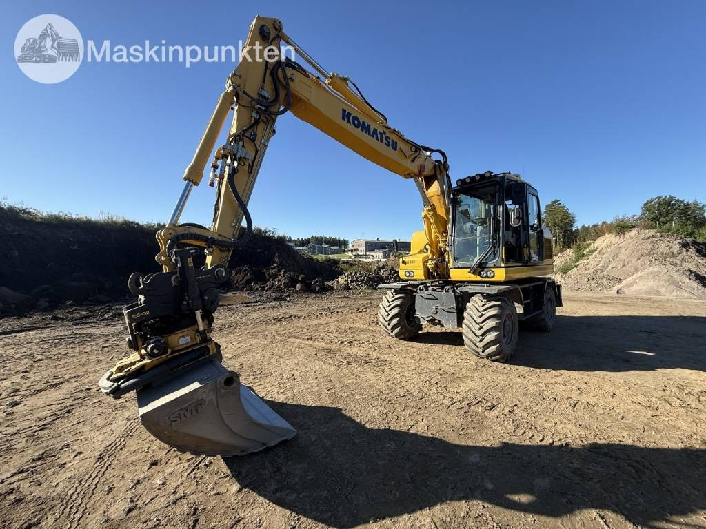 Komatsu PW 160 - Pelle sur pneus: photos 1 Komatsu PW 160 - Pelle sur pneus: photos 1