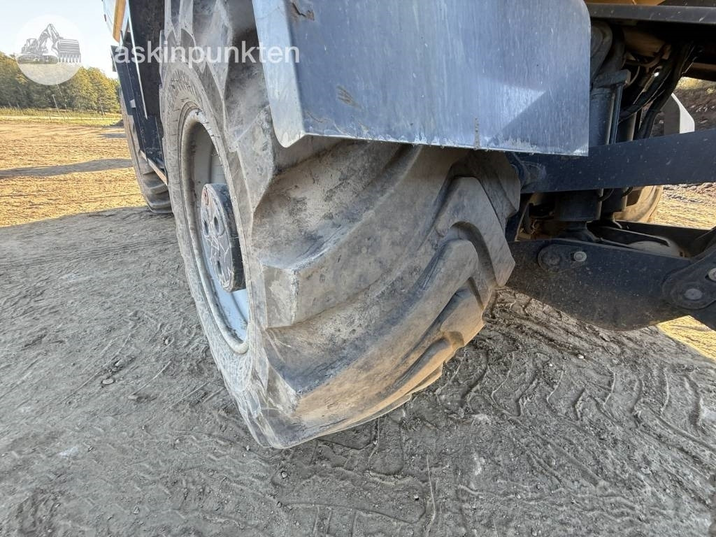 Pelle sur pneus Komatsu PW 160: photos 15
