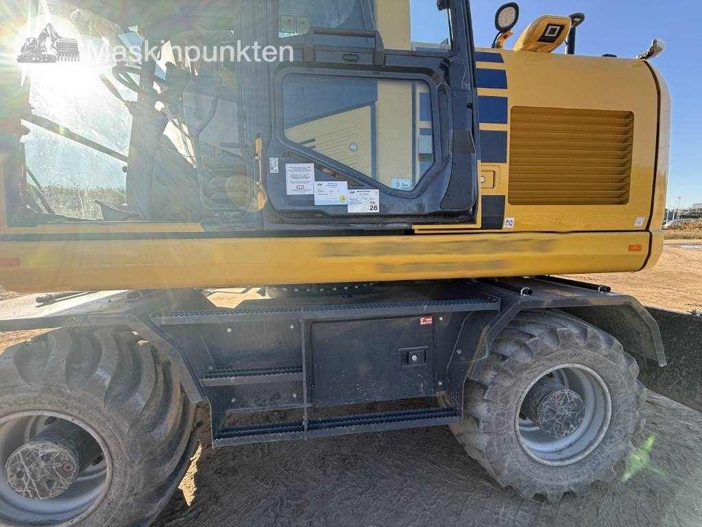 Pelle sur pneus Komatsu PW 160: photos 37