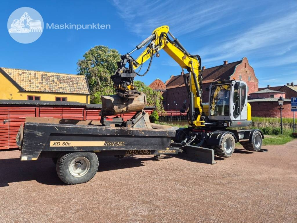Wacker Neuson EW 100 med vagn  - Pelle sur pneus: photos 1 Wacker Neuson EW 100 med vagn  - Pelle sur pneus: photos 1