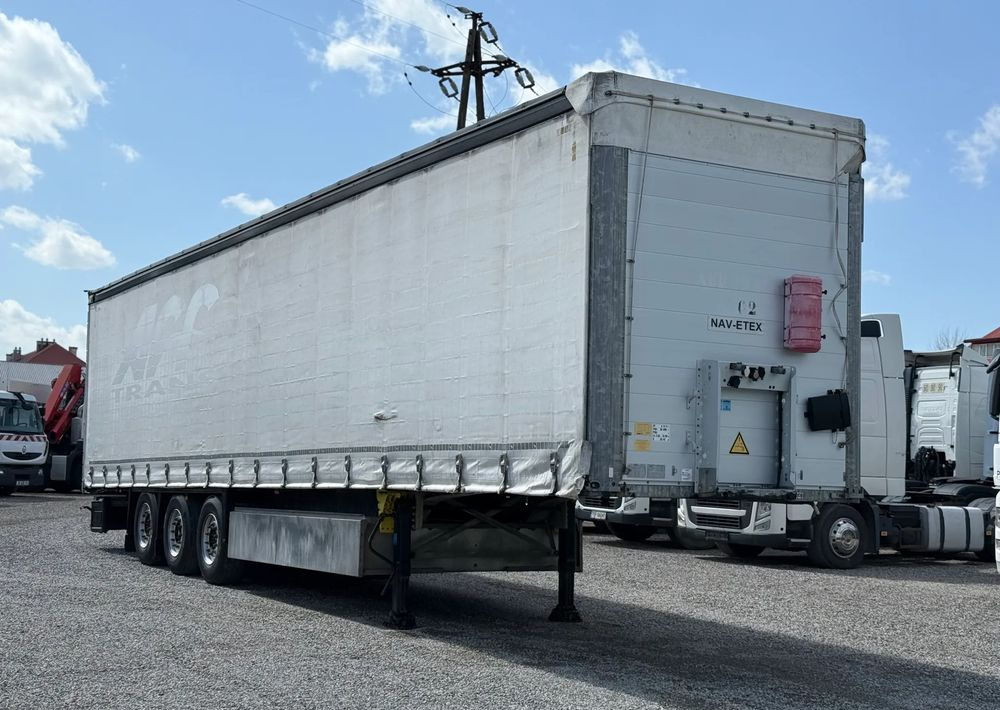 Schmitz Cargobull OSIE SCHMITZ PODNOSZONE OSIE - Semi-remorque rideaux coulissants: photos 1 Schmitz Cargobull OSIE SCHMITZ PODNOSZONE OSIE - Semi-remorque rideaux coulissants: photos 1