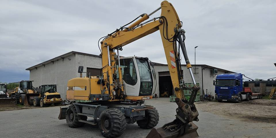 Koparka kołowa Liebherr A314 Litronic 9350 h+ 5 łyżek kołówka - Pelle sur pneus: photos 4 Koparka kołowa Liebherr A314 Litronic 9350 h+ 5 łyżek kołówka - Pelle sur pneus: photos 4