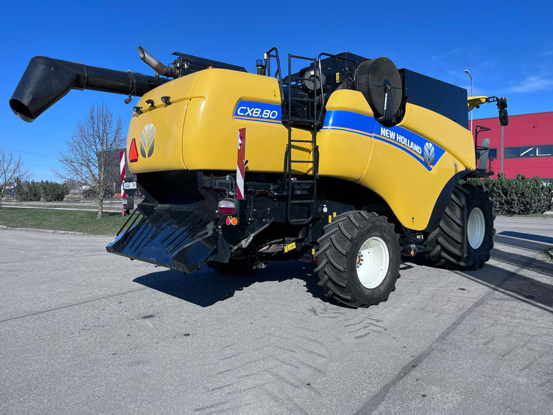 New Holland CX 8.80 - Moissonneuse-batteuse: photos 3 New Holland CX 8.80 - Moissonneuse-batteuse: photos 3