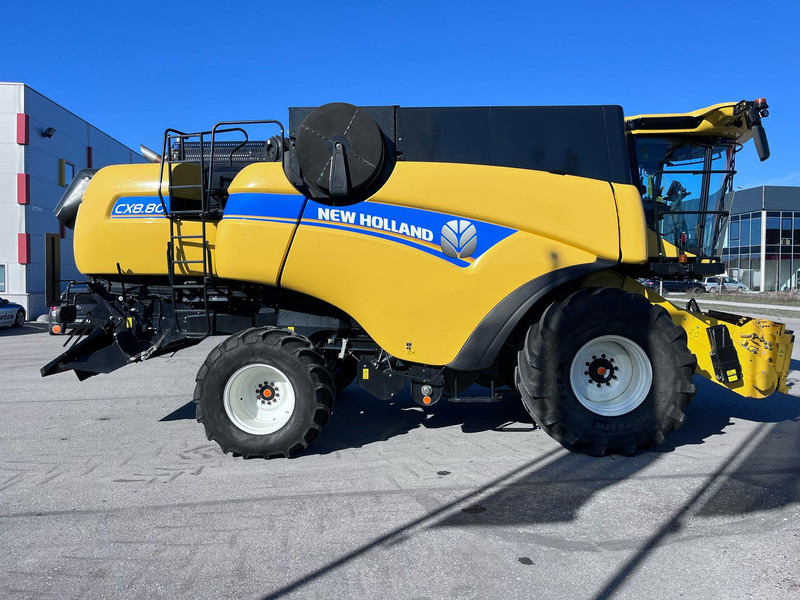 New Holland CX 8.80 - Moissonneuse-batteuse: photos 2 New Holland CX 8.80 - Moissonneuse-batteuse: photos 2