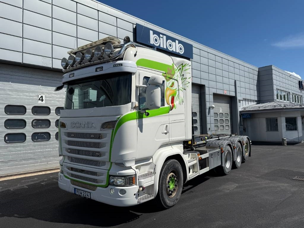 Scania R520LB8X4*4HNB - Camion ampliroll: photos 1 Scania R520LB8X4*4HNB - Camion ampliroll: photos 1