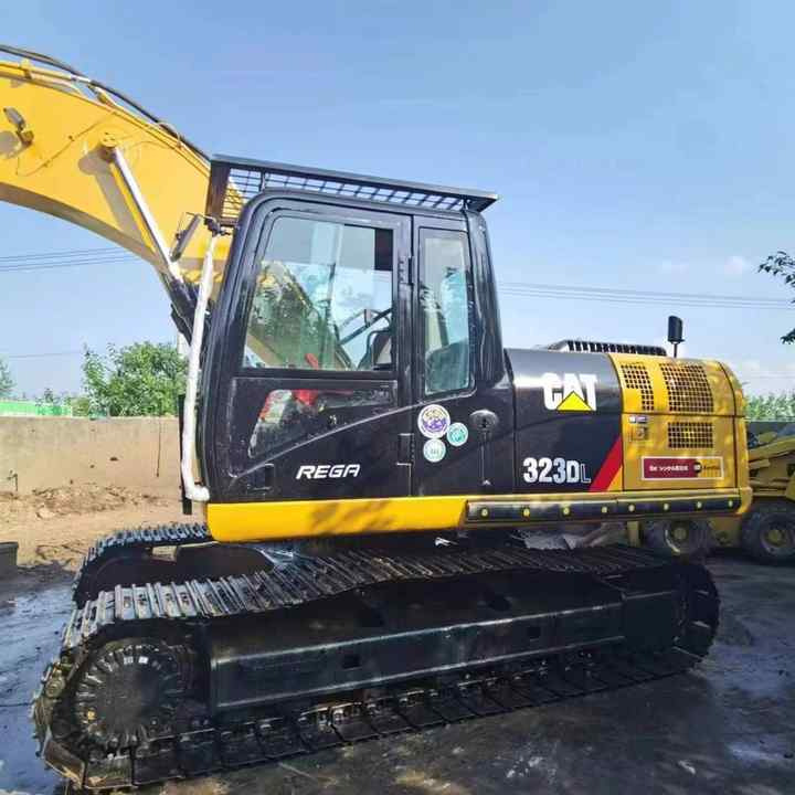 Used Digger CAT 323DL Construction Machinery Construction Digger Used CAT 323DL Cheap Excavator - Pelle sur chenille: photos 1 Used Digger CAT 323DL Construction Machinery Construction Digger Used CAT 323DL Cheap Excavator - Pelle sur chenille: photos 1