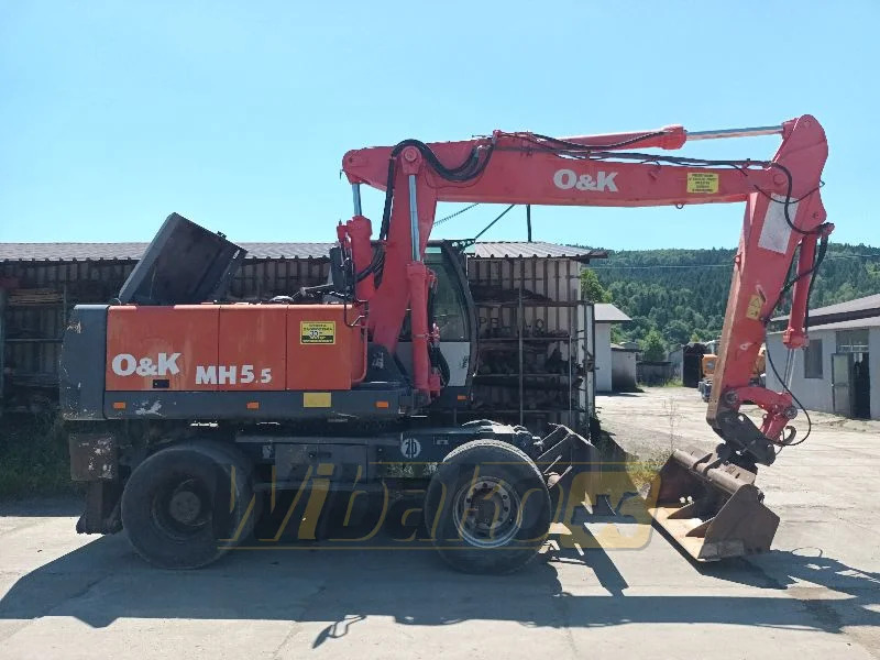 O&K MH5.5 - Pelle sur pneus: photos 2 O&K MH5.5 - Pelle sur pneus: photos 2