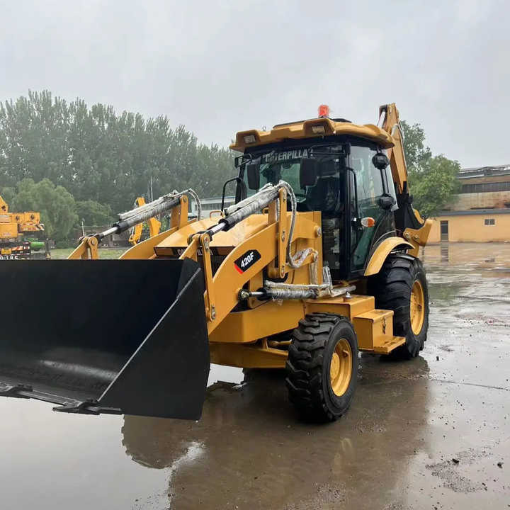 Used Wheel Loader CAT420F Caterpillar 420F Construction Machinery Mini Wheel Skid Steer Loader in Stock - Tractopelle: photos 1 Used Wheel Loader CAT420F Caterpillar 420F Construction Machinery Mini Wheel Skid Steer Loader in Stock - Tractopelle: photos 1