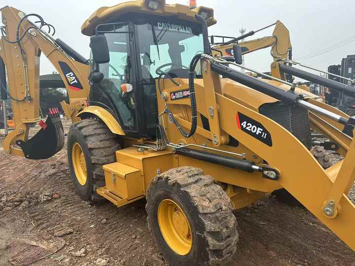 Used Wheel Loader CAT420F Caterpillar 420F Mini Construction Machinery Mini Wheel Skid Steer Loader in Stock - Tractopelle: photos 2 Used Wheel Loader CAT420F Caterpillar 420F Mini Construction Machinery Mini Wheel Skid Steer Loader in Stock - Tractopelle: photos 2