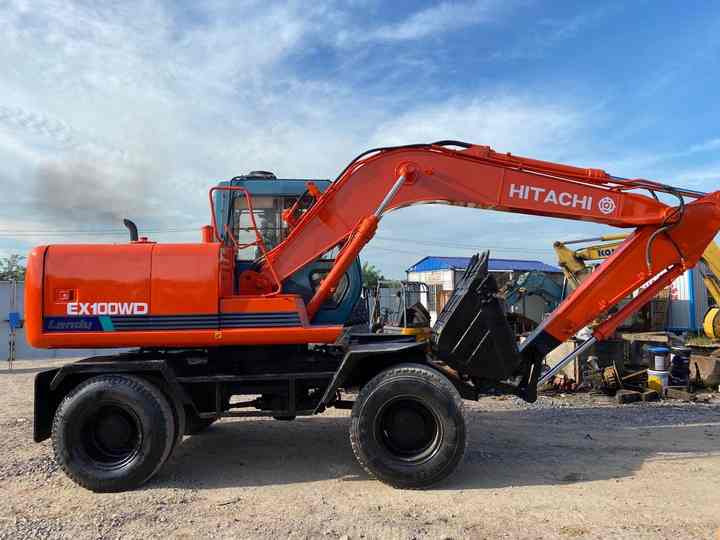 Used Hitachi Ex100WD Wheel Excavator for Sale Japan Made Hitachi Ex100wd Wheeled Excavator for Sale - Pelle sur chenille: photos 2 Used Hitachi Ex100WD Wheel Excavator for Sale Japan Made Hitachi Ex100wd Wheeled Excavator for Sale - Pelle sur chenille: photos 2