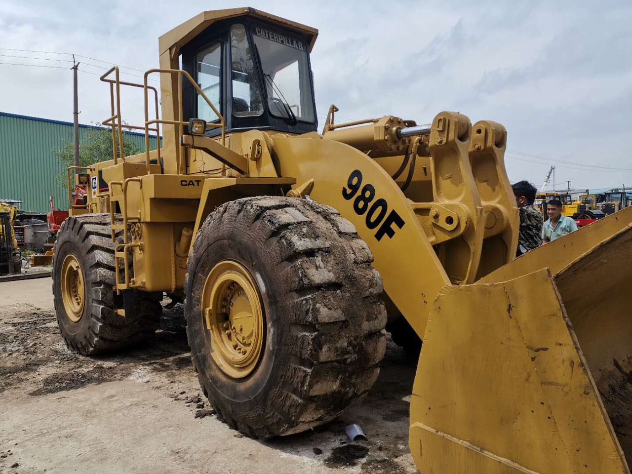CATERPILLAR Wheel Loader CAT 980F - Chargeuse sur pneus: photos 1 CATERPILLAR Wheel Loader CAT 980F - Chargeuse sur pneus: photos 1