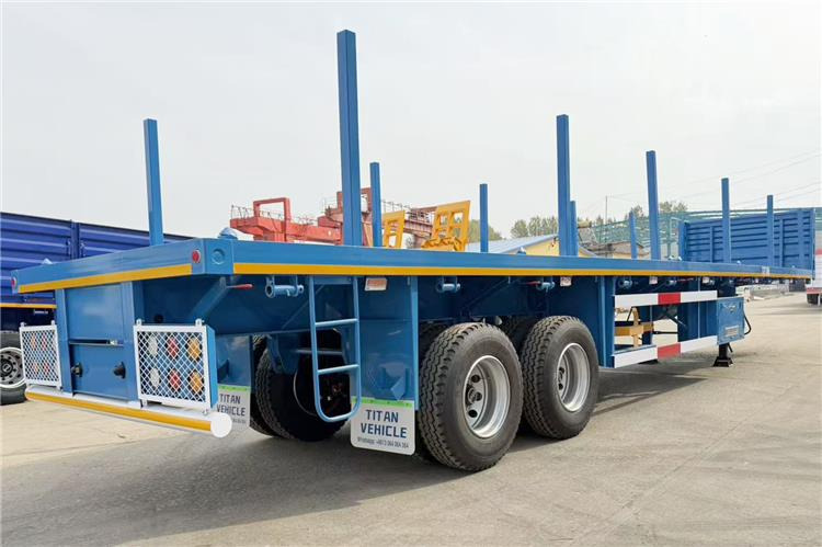 TITAN 2 Axle Wood Log Trailer Flatbed Trailer for Sale In Zimbabwe - Semi-remorque plateau: photos 1 TITAN 2 Axle Wood Log Trailer Flatbed Trailer for Sale In Zimbabwe - Semi-remorque plateau: photos 1