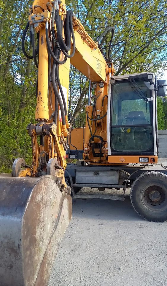 Liebherr A316 - Pelle sur pneus: photos 2 Liebherr A316 - Pelle sur pneus: photos 2