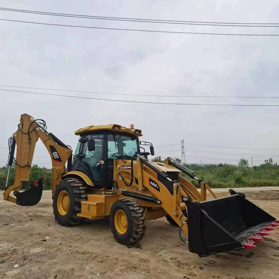 CATERPILLAR 420F backhoe loader stock new low hour jcb TLB - Tractopelle: photos 1 CATERPILLAR 420F backhoe loader stock new low hour jcb TLB - Tractopelle: photos 1