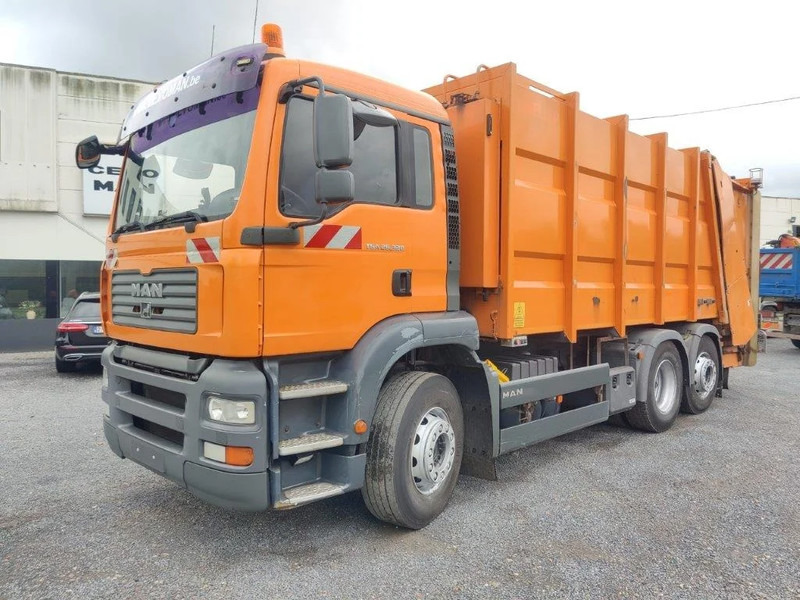 MAN TGA 26.320 6x2 garbage truck ZOELLER - Benne à ordures ménagères: photos 1 MAN TGA 26.320 6x2 garbage truck ZOELLER - Benne à ordures ménagères: photos 1