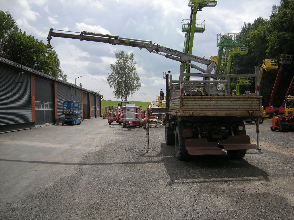 Mercedes-Benz Unimog U1250 mit Kran MKG 105 - Utilitaire benne: photos 4 Mercedes-Benz Unimog U1250 mit Kran MKG 105 - Utilitaire benne: photos 4