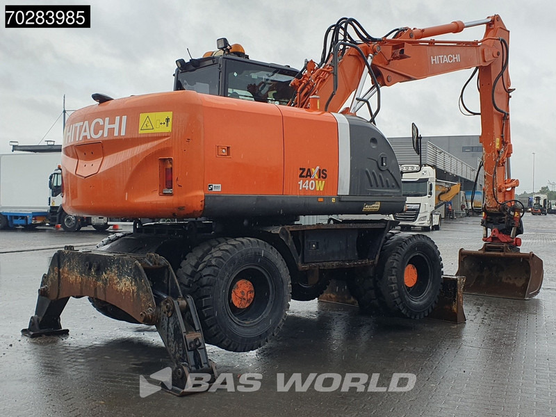 Hitachi ZX140W -3 OUTRIGGERS - ROTOTILT - Pelle sur pneus: photos 5 Hitachi ZX140W -3 OUTRIGGERS - ROTOTILT - Pelle sur pneus: photos 5