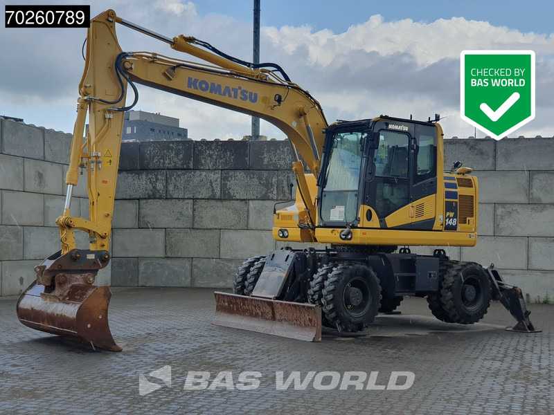 Komatsu PW148 -11 - Pelle sur pneus: photos 1 Komatsu PW148 -11 - Pelle sur pneus: photos 1