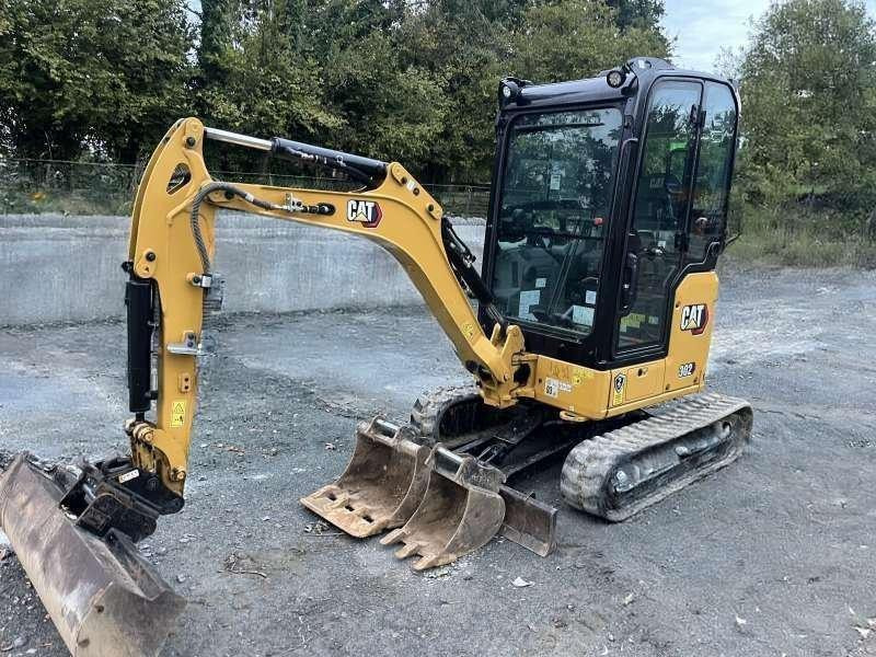 Caterpillar 302 - Mini pelle: photos 1 Caterpillar 302 - Mini pelle: photos 1