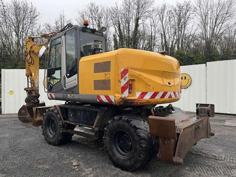 Hitachi ZX140W-3 - Pelle sur pneus: photos 4 Hitachi ZX140W-3 - Pelle sur pneus: photos 4