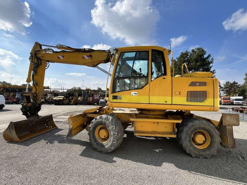 Volvo EW140D - Pelle sur pneus: photos 4 Volvo EW140D - Pelle sur pneus: photos 4