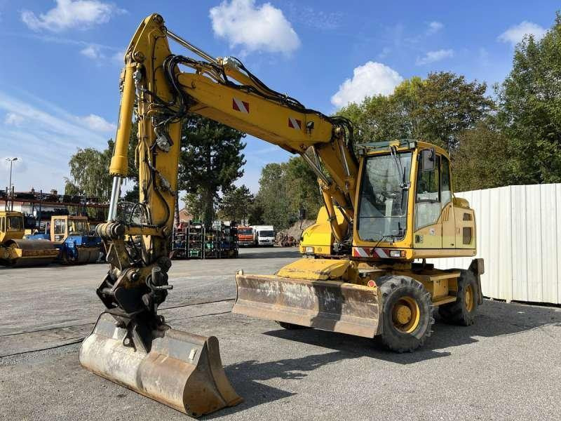 Volvo EW140D - Pelle sur pneus: photos 2 Volvo EW140D - Pelle sur pneus: photos 2