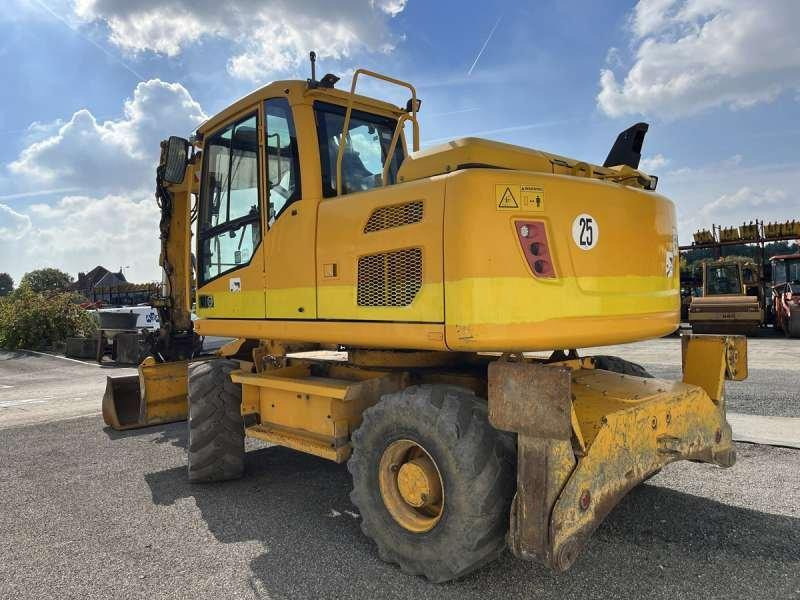 Volvo EW140D - Pelle sur pneus: photos 5 Volvo EW140D - Pelle sur pneus: photos 5