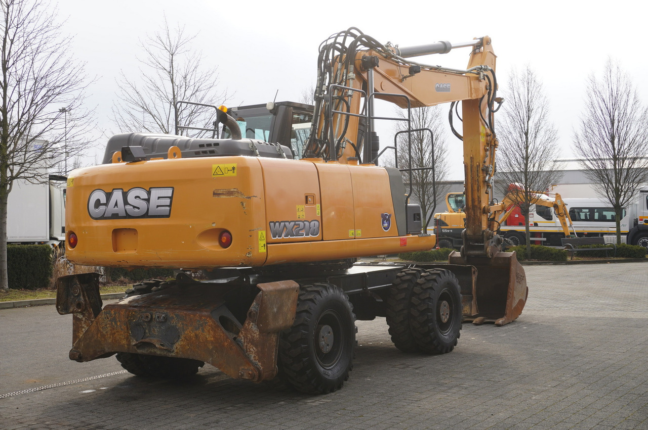 CASE WX218 / 23t wheeled excavator / 3 times folding arm - Pelle sur pneus: photos 5 CASE WX218 / 23t wheeled excavator / 3 times folding arm - Pelle sur pneus: photos 5