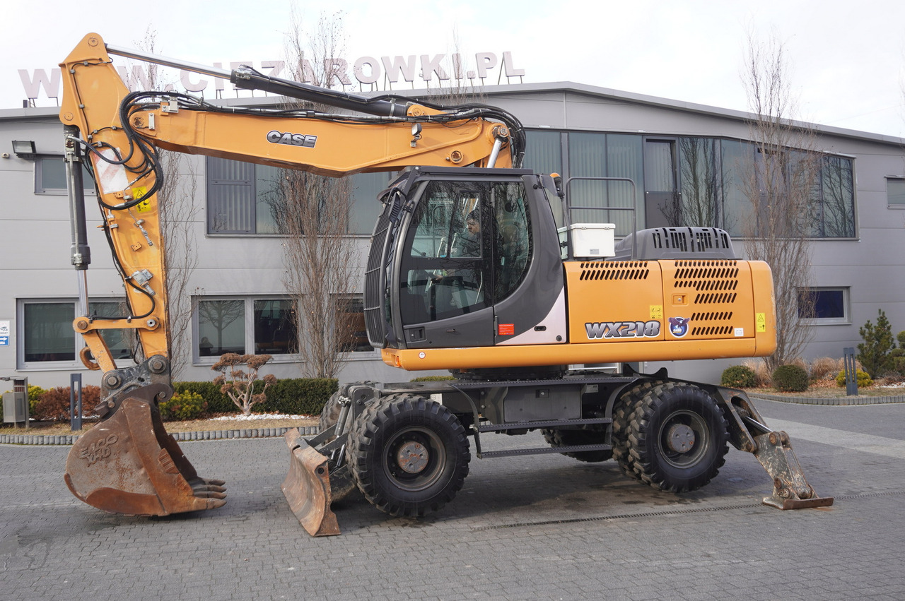CASE WX218 / 23t wheeled excavator / 3 times folding arm - Pelle sur pneus: photos 3 CASE WX218 / 23t wheeled excavator / 3 times folding arm - Pelle sur pneus: photos 3