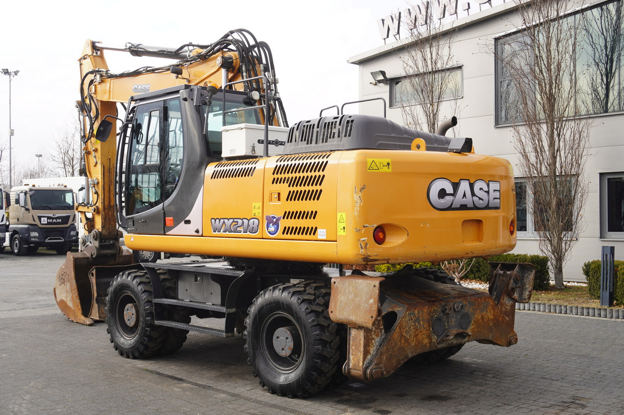 CASE WX218 / 23t wheeled excavator / 3 times folding arm - Pelle sur pneus: photos 4 CASE WX218 / 23t wheeled excavator / 3 times folding arm - Pelle sur pneus: photos 4