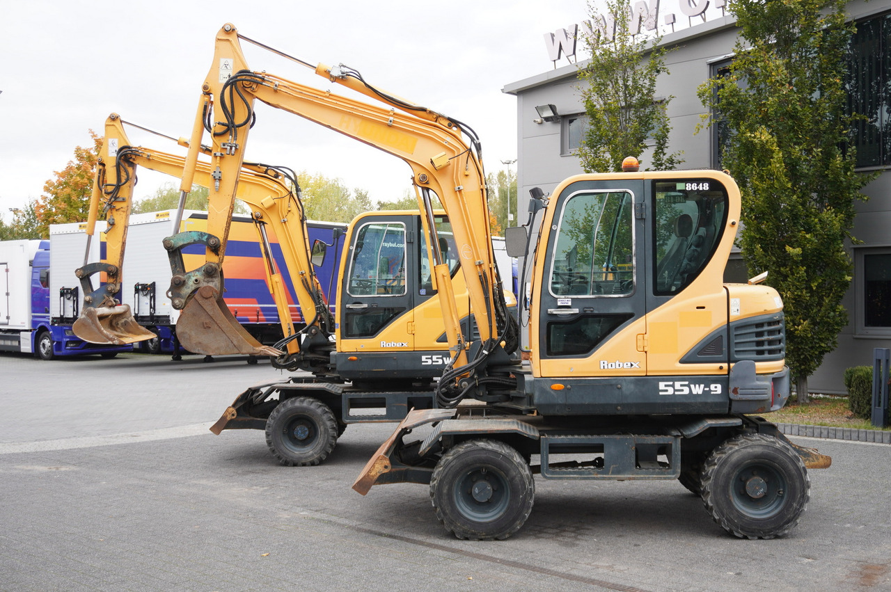 Hyundai Robex 55W-9 Wheeled Excavator 5.5t / 2pcs - Pelle: photos 1 Hyundai Robex 55W-9 Wheeled Excavator 5.5t / 2pcs - Pelle: photos 1