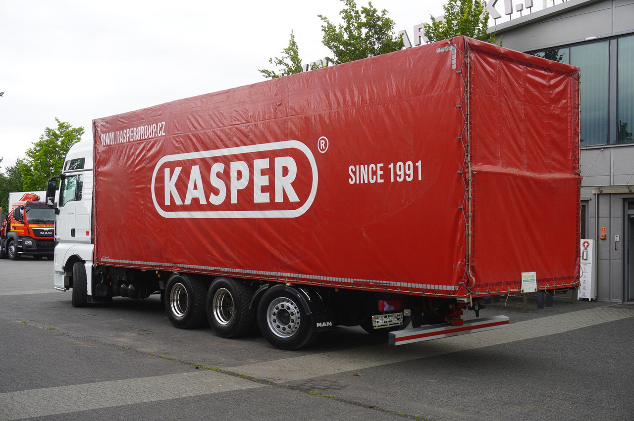 MAN MAN TGX 35.580 E6 8x4 /4 / 23 EPAL tarp superstructure / 4th axle steered - Camion à rideaux coulissants: photos 3 MAN MAN TGX 35.580 E6 8x4 /4 / 23 EPAL tarp superstructure / 4th axle steered - Camion à rideaux coulissants: photos 3