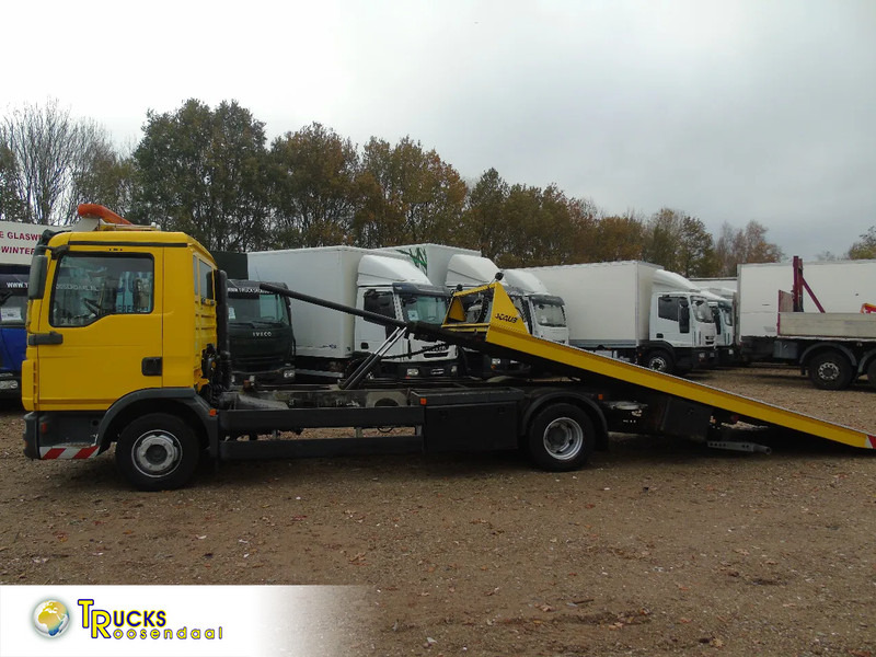 MAN TGL 8.180 + winch + MANUAL + EURO 5 + system working + platform 6 meter - Camion porte-voitures: photos 1 MAN TGL 8.180 + winch + MANUAL + EURO 5 + system working + platform 6 meter - Camion porte-voitures: photos 1