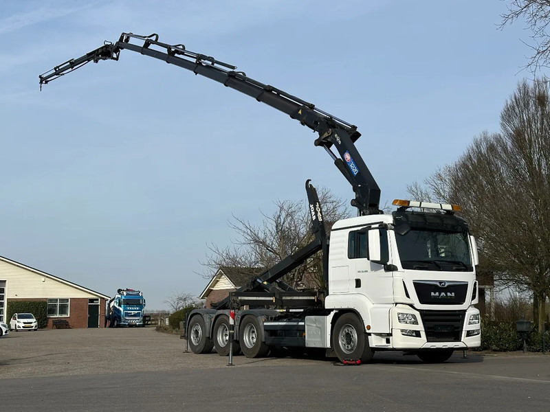 MAN TGS 35.500 8x4!!TRIPLE!!HMF 32TM/FLYJIB/HOOKLIFT!!EURO6!! ROOF/DACH/CONSTRUCTION!!203tkm!! TOP!! - Camion ampliroll, Camion grue: photos 1 MAN TGS 35.500 8x4!!TRIPLE!!HMF 32TM/FLYJIB/HOOKLIFT!!EURO6!! ROOF/DACH/CONSTRUCTION!!203tkm!! TOP!! - Camion ampliroll, Camion grue: photos 1
