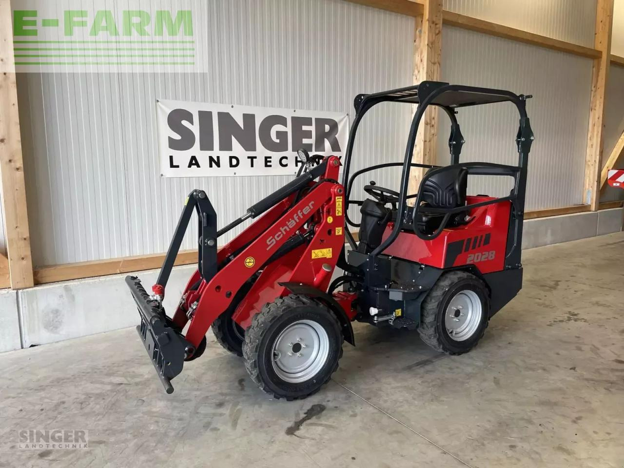 Schäffer 2028-2 - Chargeuse sur pneus: photos 1 Schäffer 2028-2 - Chargeuse sur pneus: photos 1