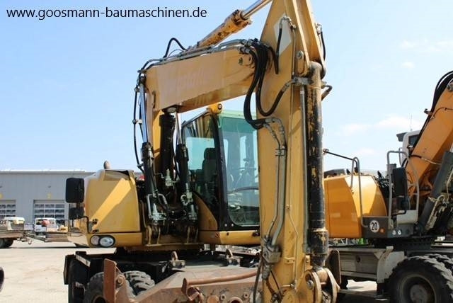 CAT M 315 D - Pelle sur pneus: photos 5 CAT M 315 D - Pelle sur pneus: photos 5