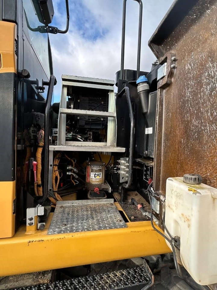 CAT M 318 F - Pelle sur pneus: photos 5 CAT M 318 F - Pelle sur pneus: photos 5